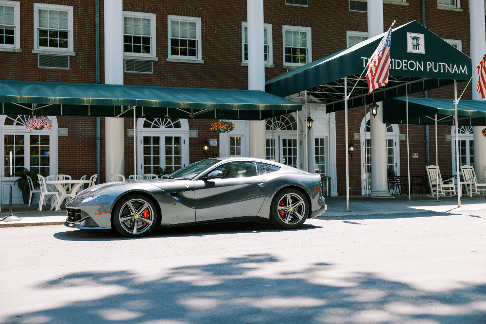 2015 Ferrari F12 Berlinetta rear three-quarter view, for sale at Saratoga Motorcar Auction